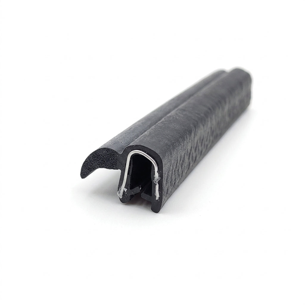 Black rubber grip seal with curved lip and metal-toothed clip, angled shot