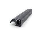 Black rubber grip seal with curved lip and metal-toothed clip, angled shot