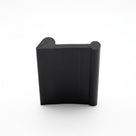 Black rubber U-channel headlamp beading, upright end-on studio shot