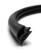 Black windscreen surround coiled into a loop, angled studio shot
