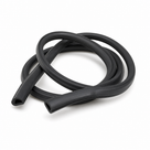 Coiled length of black windscreen rubber seal on white background