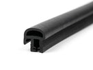 Black rubber windscreen seal with a bulb channel, close-up studio shot