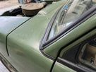 Seal fitted around the windscreen pillar of a green classic Range Rover