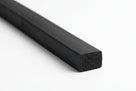 Black square-profile sponge strip cut end on white background showing porous closed-cell texture
