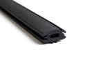 Angled view of black rubber sealing strip with ribbed flange and hollow bulb