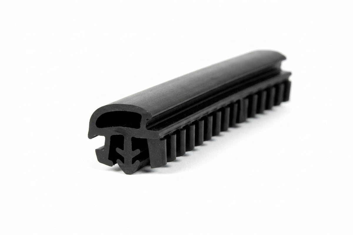 Black quarterlight seal with a fine serrated edge, photographed at an angle