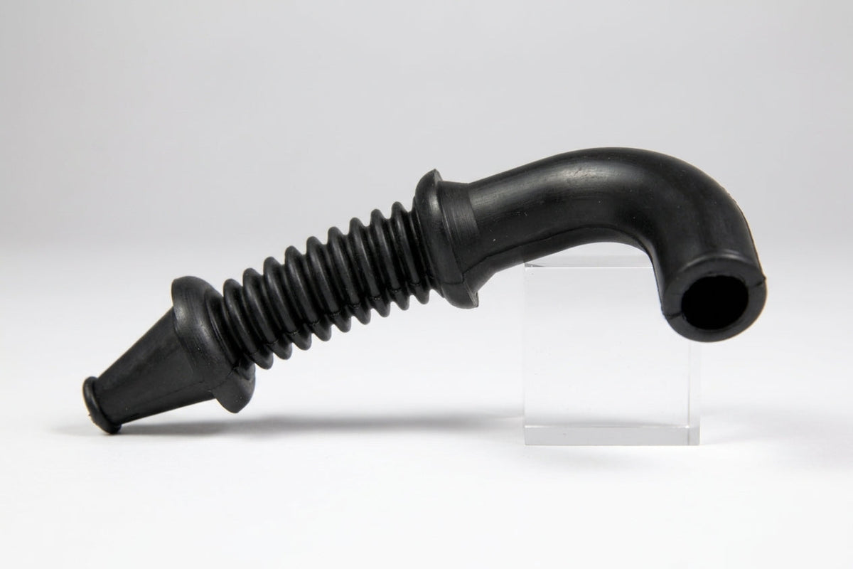Black ribbed door grommet with curved spout, on stand, white background
