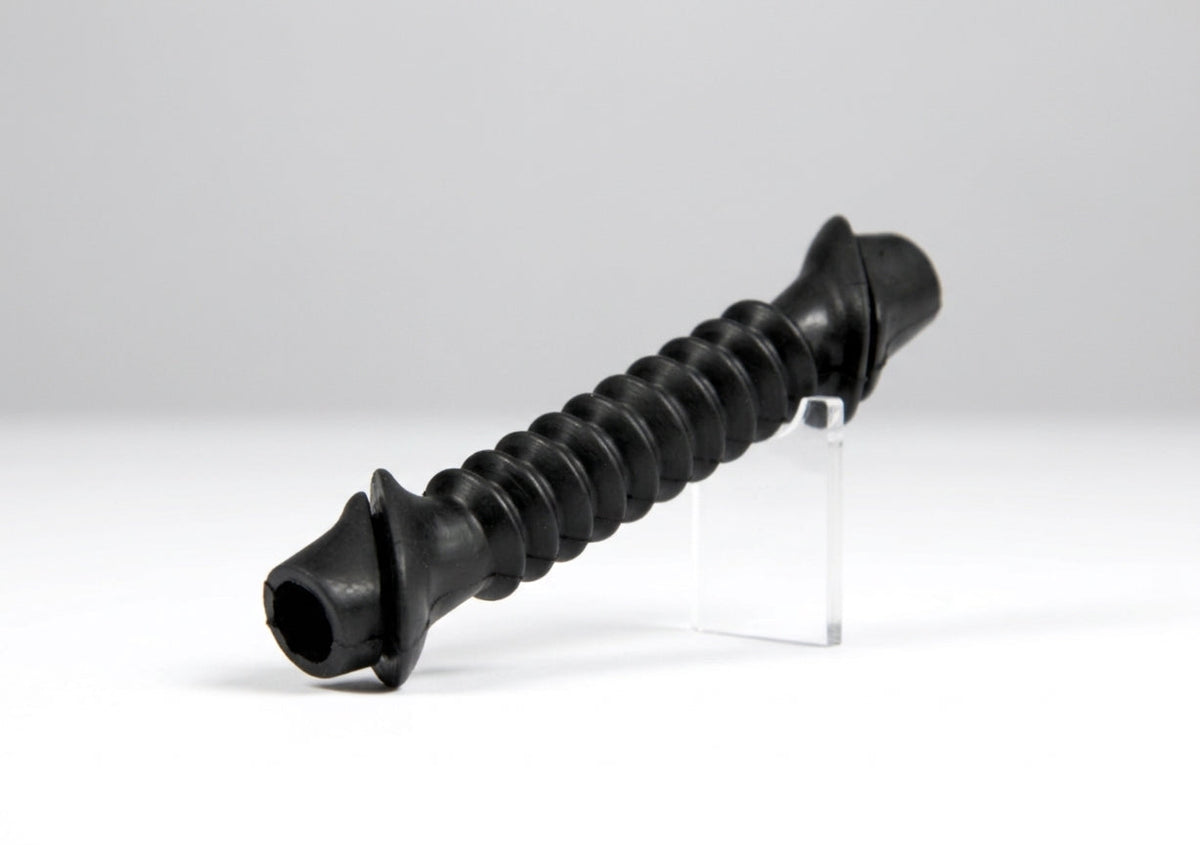 Black ribbed washer pipe grommet with tapered ends, on a stand