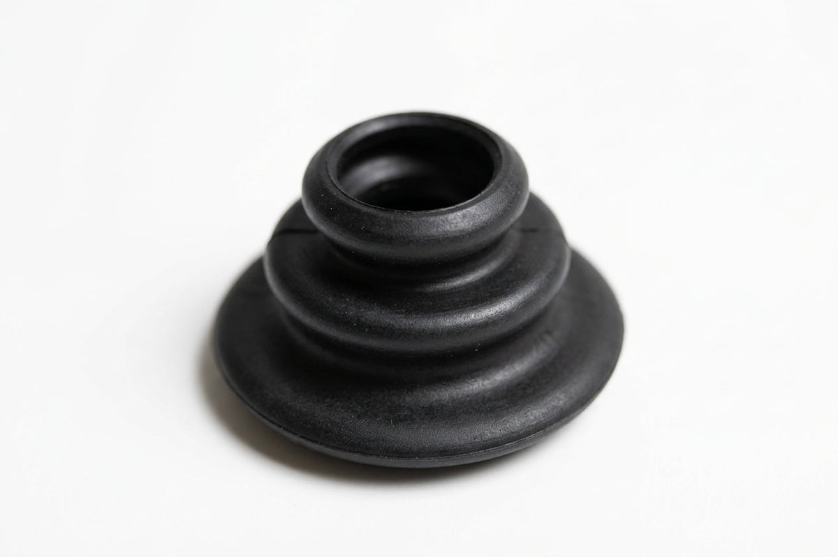 Black ribbed conical cable grommet, studio shot, white background