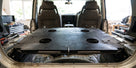Diaphragm resting on a seat base inside a Land Rover Discovery's rear cabin
