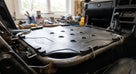 Seat diaphragm fitted into a Triumph TR7 seat frame, interior view