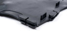 Close-up corner of a moulded black rubber seat diaphragm, white background