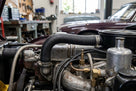 Breather hose fitted in situ on a classic car's engine block