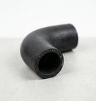 Black EPDM elbow hose with yellow Kevlar reinforcement threads visible at cut end