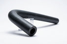 Black heater return hose curved into a loop, studio shot on stand