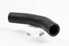 Curved black rubber radiator hose on a clear stand, studio white background