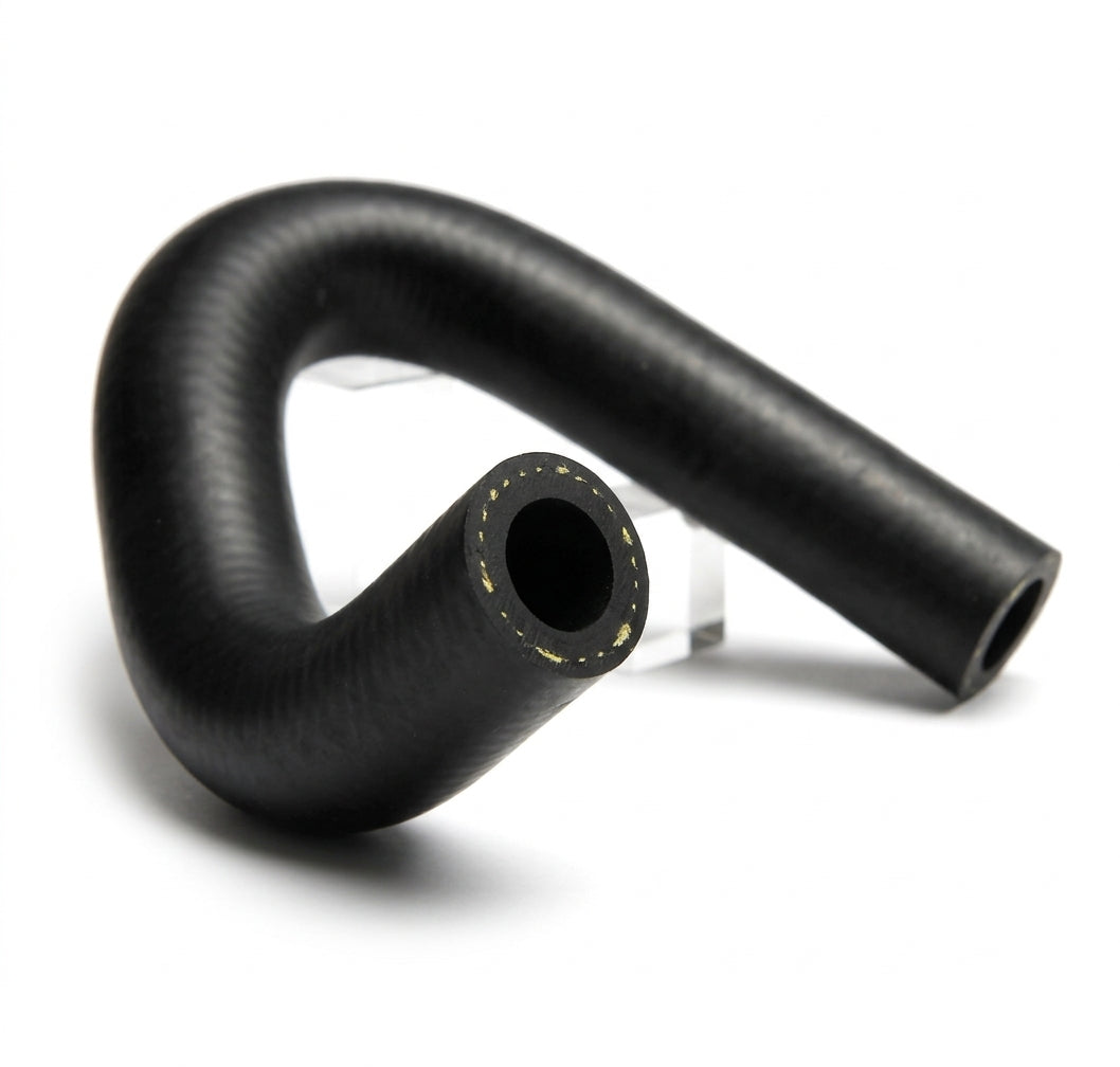 Looped black rubber heater hose with reinforced bore, studio shot on white