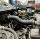 Heater hose fitted in the engine bay of a Triumph TR8, close-up