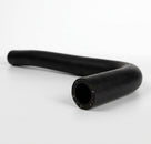 Black heater hose with S-shaped curve, studio shot showing cut end detail