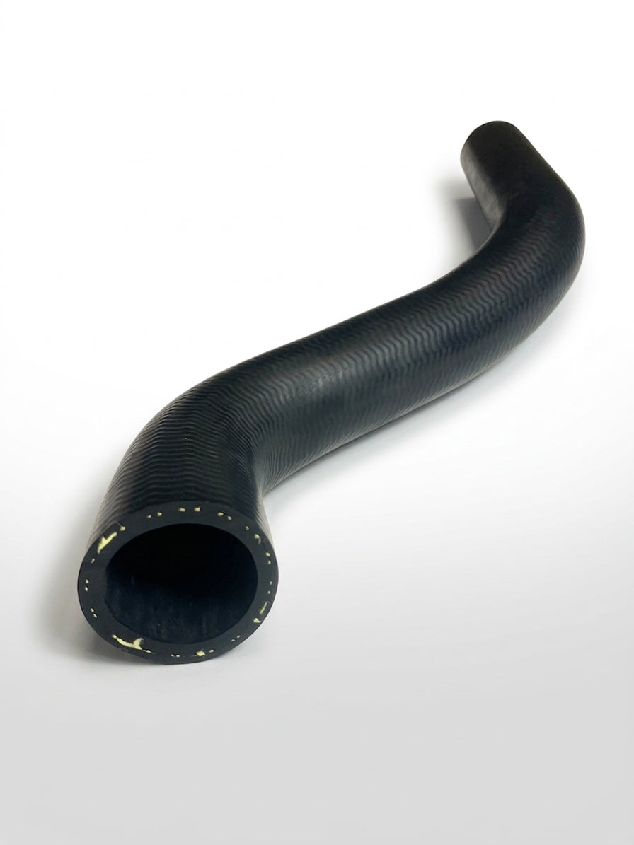 Black ribbed radiator hose with bent end, coiled on white background