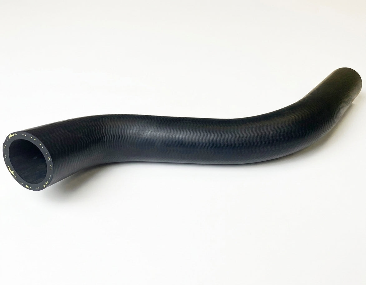 Curved black textured radiator hose with cut end facing left, studio shot