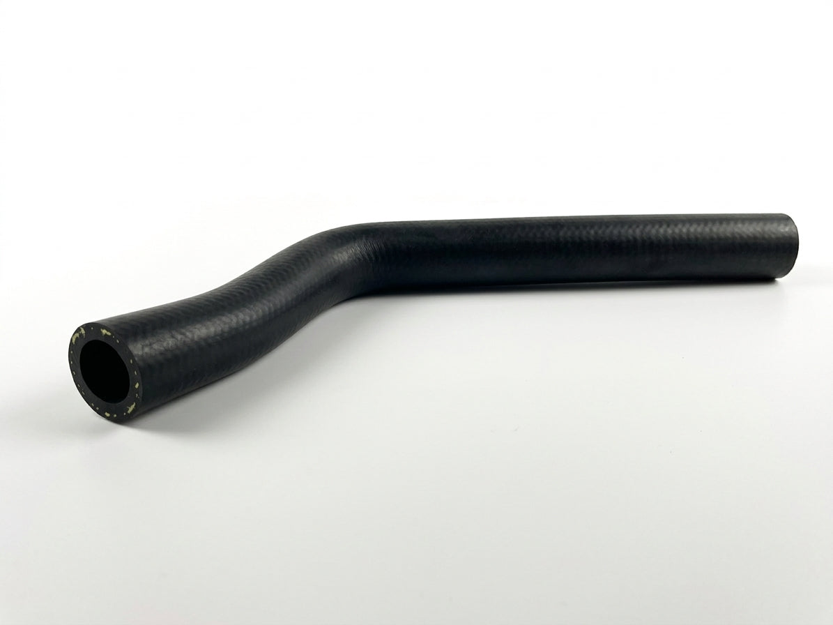 Angled black rubber top radiator hose on white background, studio shot