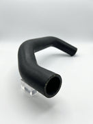 Black radiator hose with S-shaped bend, studio shot on stand