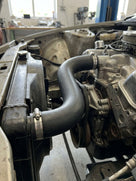 Bottom radiator hose fitted in a Triumph TR8 engine bay