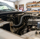 Heater hose fitted between radiator and engine on a Triumph TR7
