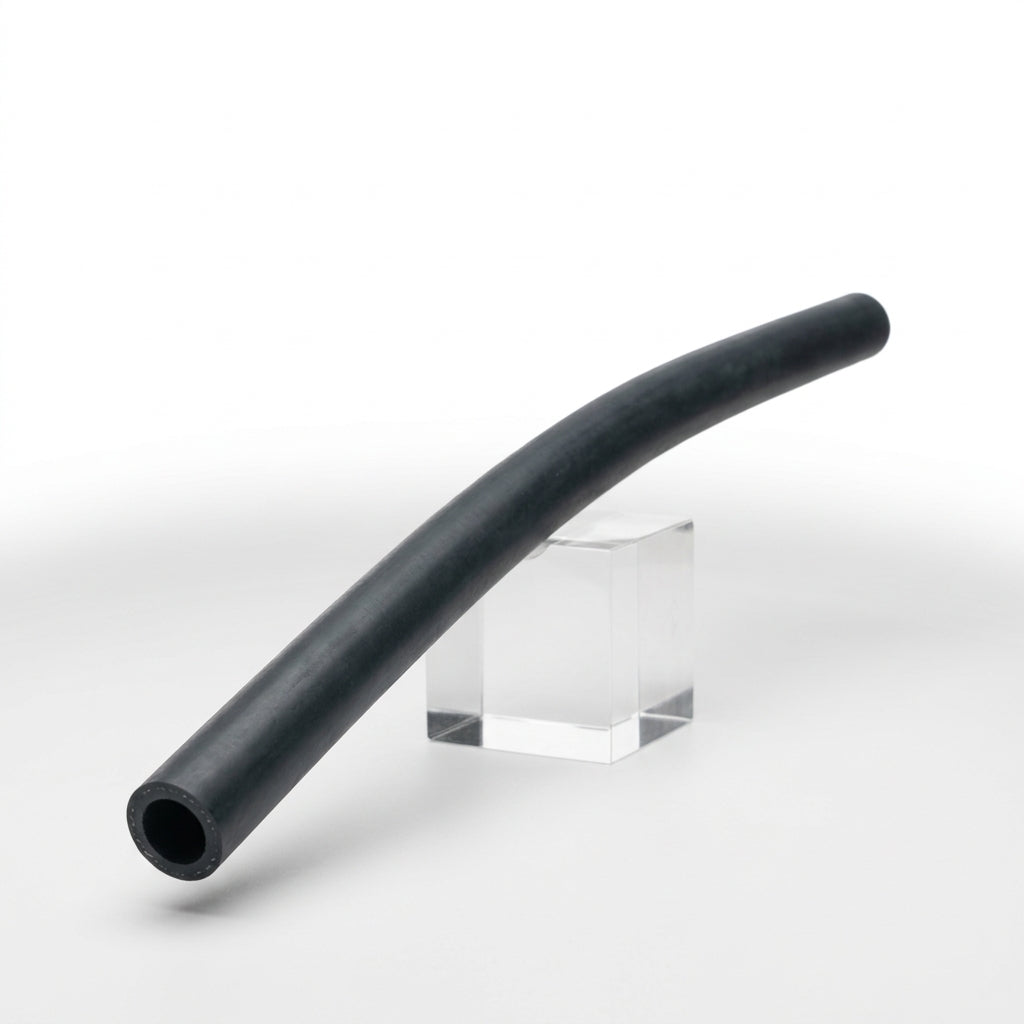 Curved black rubber hose resting on a clear stand, studio shot