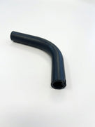 Black radiator hose with tight bend, studio shot on white