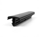 Satin black bumper trim profile, angled view showing clip-in channel, white background