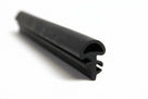 Black rubber C-post seal with fin profile, coiled length on white background