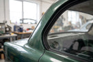 C-post seal fitted to the rear quarter window of a green classic Jaguar saloon