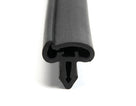 Black rubber door seal with barbed mounting leg, angled length shot on white background