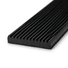 Black fluted rubber matting shown end-on, close-up studio shot