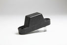 Moulded black rubber tailboard buffer block with two mounting holes