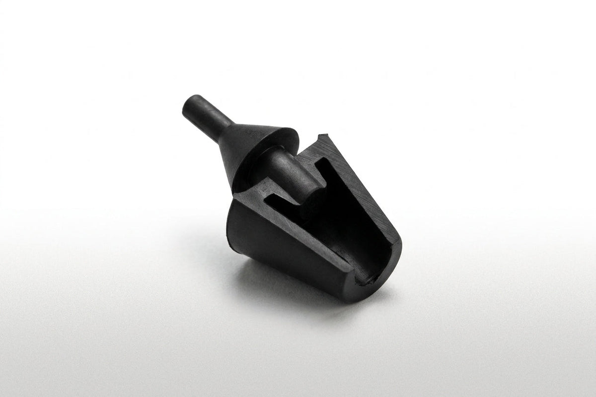 Black conical rubber buffer with mounting stem, angled studio shot