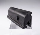 Black moulded door buffer on a stand, angled studio shot