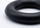 Black rubber exhaust mounting ring, close-up studio shot showing the torus profile