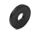 Black rubber differential mounting pad, angled studio shot of flat disc