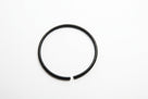 Large black nitrile O-ring laid flat, overhead shot on white background