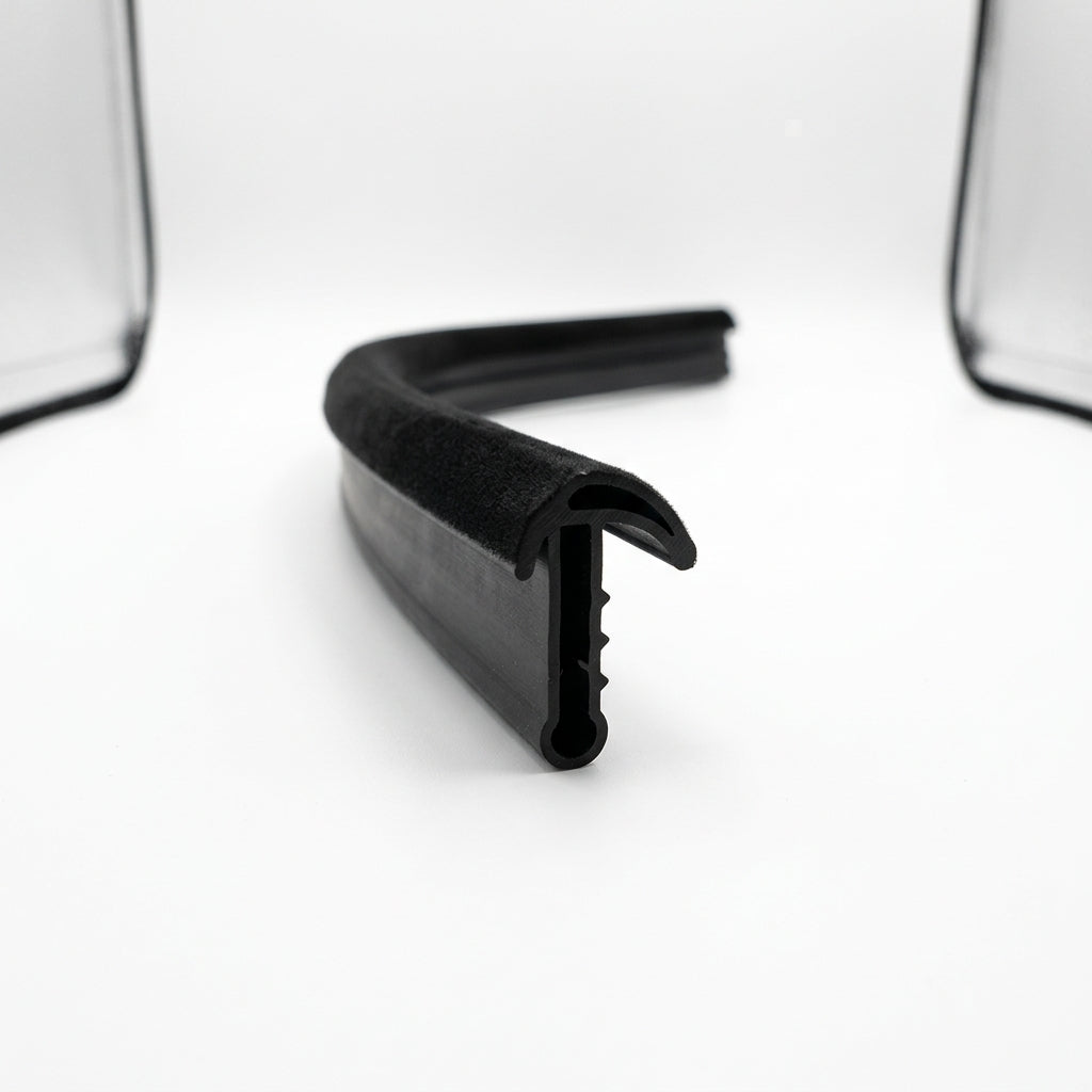 Black flocked outer waist strip profile shown end-on against white background