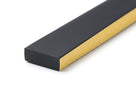 Thin black foam strip shown at an angle with gold adhesive backing paper