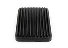Black ribbed rubber accelerator pedal pad, angled studio shot on white background