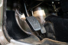 Accelerator pedal fitted in situ in a classic car's footwell