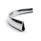 Curved length of chrome plastic trim with narrow teardrop channel, studio shot