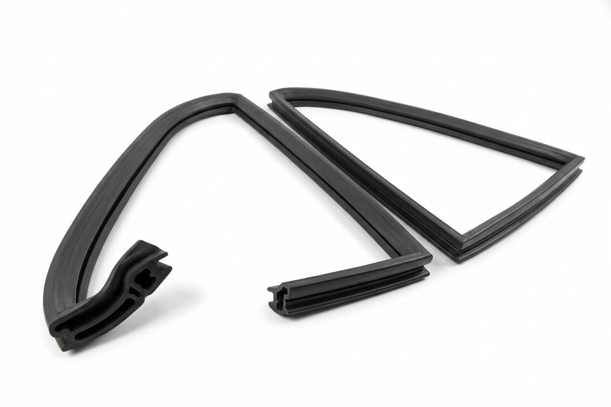 Pair of curved black triangular quarterlight seal frames, white background
