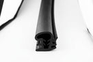 End-on view of black quarterlight seal showing its serrated gripping channel