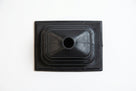 Black rectangular rubber gear gaiter viewed from above, studio shot